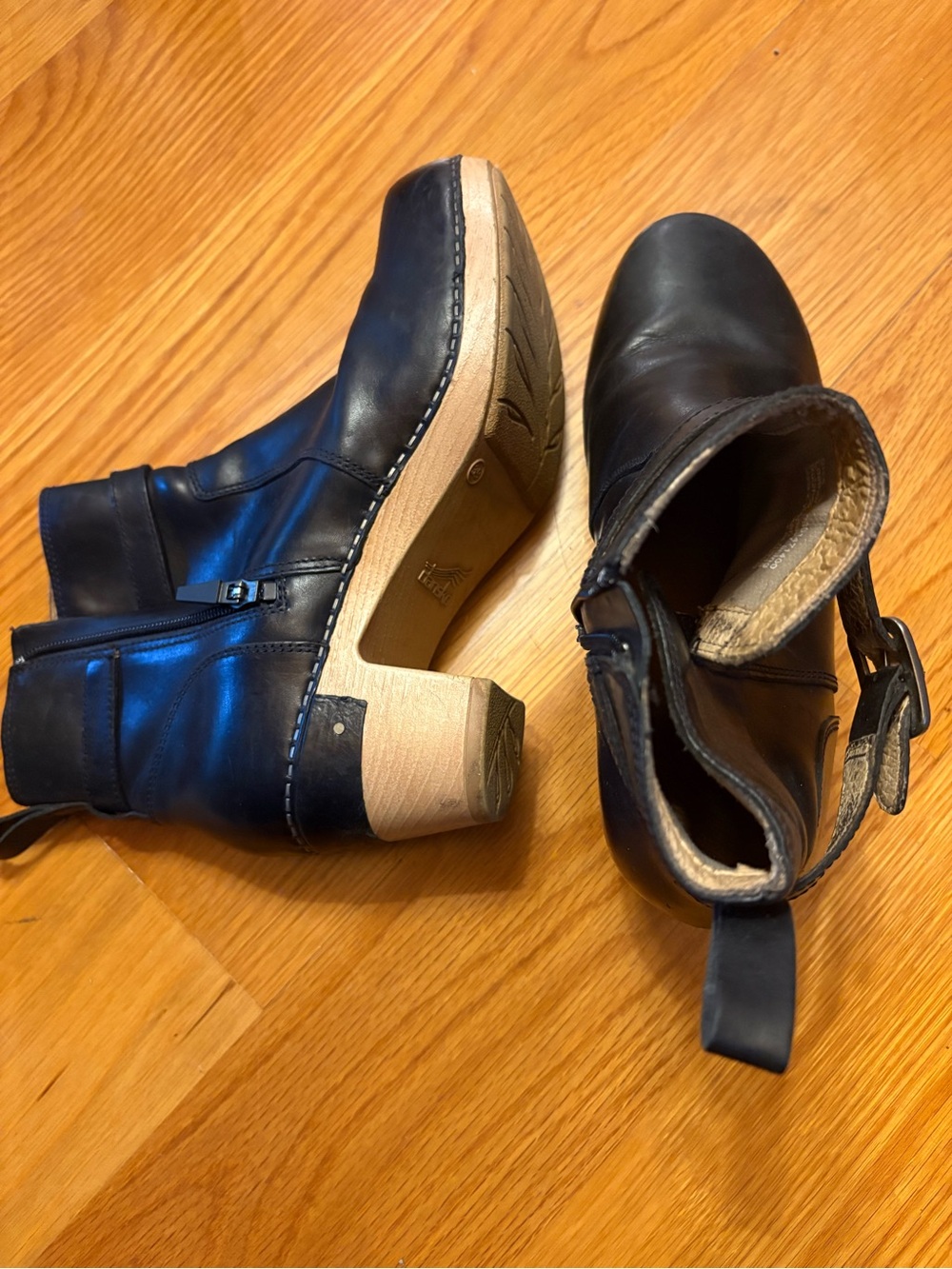 Dansko Black Leather Heeled Ankle Boots with Wood-Tone Stack
